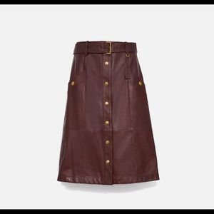 Coach Women’s “Snap Front Leather Skirt”. New With Tags! Size 10!